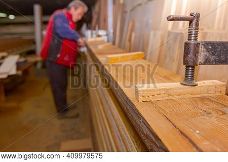 Process Of Drying Glue In The Manual Production Of Wooden Profiles In Carpentry. Clamp Tool For Fixi