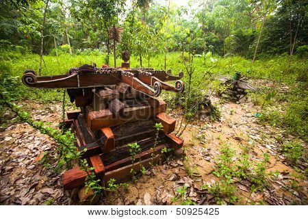 BERDUT, MALAYSIA - APR 8: Cemetery in village Orang Asli in his village on Apr 8, 2013 in Berdut, Malaysia. More than 76% of all Orang Asli live below the poverty line, life expectancy - 53 years old.