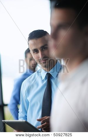 close-up of human hand  business man using tablet compuer at office