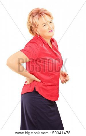 Mature woman suffering from a back pain isolated on white background