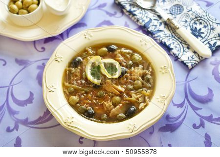 Fish solyanka with capers and olives