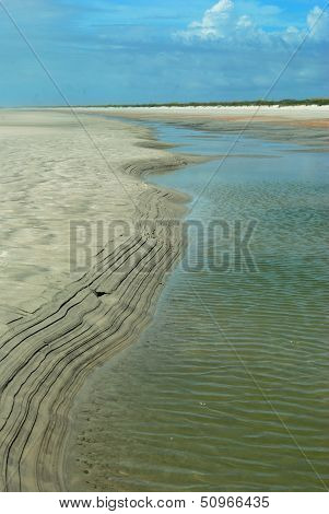 Layered sands along tidal pool