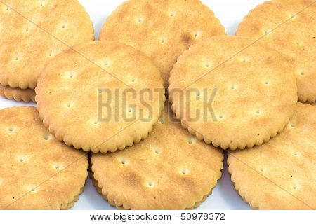 Yellow biscuits on white background