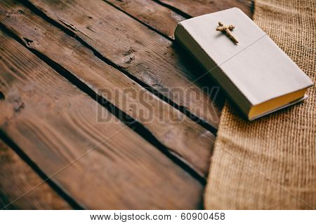 Image of the Holy Writ on wooden background 