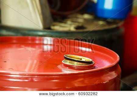 Red Oil Barrels In Mechanic Garage Car Service Or Shop
