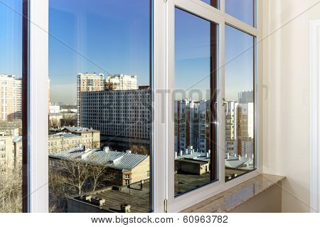 View To The City Through New Windows