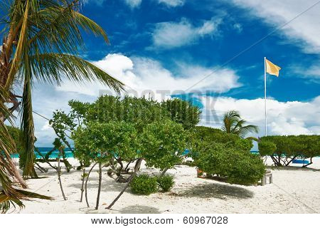 Beautiful island beach with sandspit at Maldives