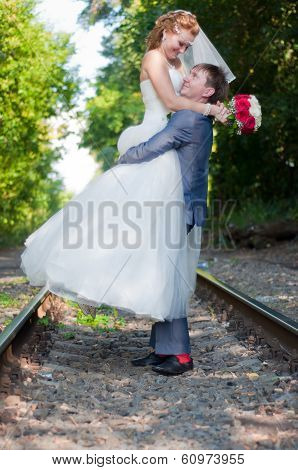 Happy Newlyweds On Walk