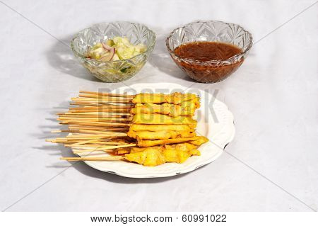 Grilled Pork Satay With Peanut Sauce And Vinegar.