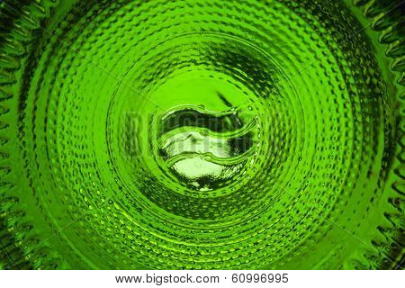 close-up of wine bottle bottom, green abstract