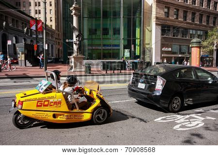 San Francisco, Usa - Oct 2, 2011: Tourists Make Gps-guided Tour On Special Equipped Three-wheel Stor