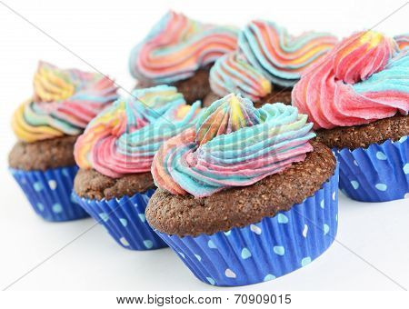 Chocolate cupcakes with colour icing