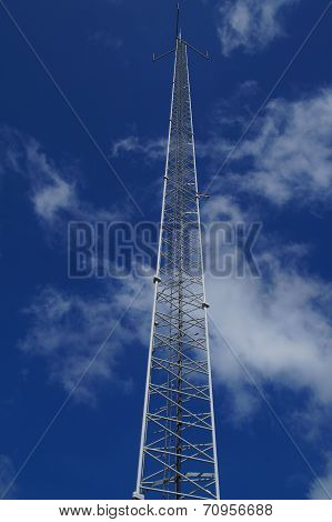 Telecommunication pole with antenna