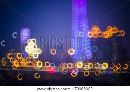 Blurred city lights and office buildings, guanzhou china.