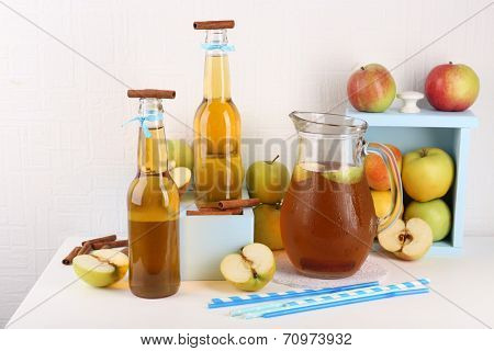Still life with tasty apple cider and fresh apples