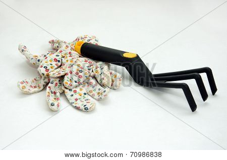 Garden Rake and flower garden gloves