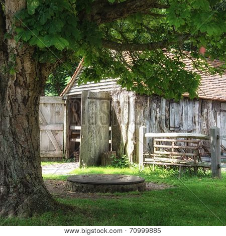 Ancient Medieval Ironmonger Shed In Forest Landscape Setting