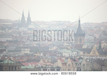 New Town Hall in Charles Square and Saint Ludmila Church viewed from Petrin Hill in Prague, Czech Republic.