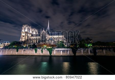 Paris, Notre Dame Cathedral By Night From Seine River