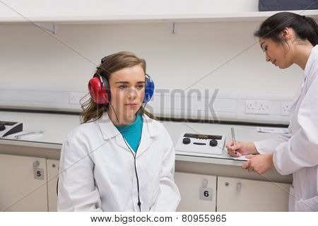 Student doing a hearing test at the university
