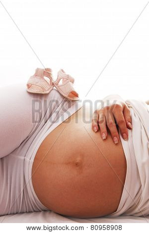 a pregnant woman on a white background