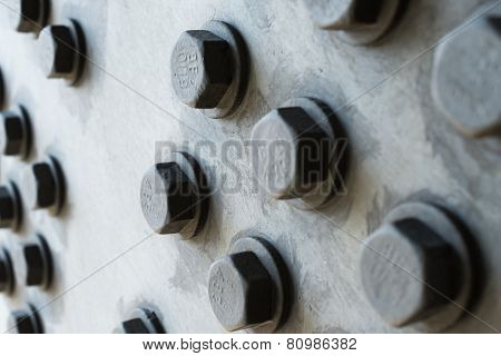 Gray Metal Surface With Hexagonal Bolt Heads