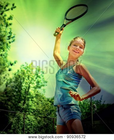 Girl sportsman with racket and ball in the sun and green trees. Toned image.