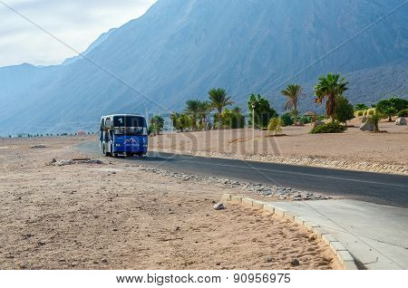 Local Minibus On The Road In The Resort Area Of Egypt