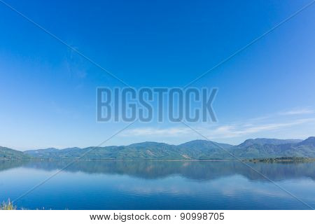 Scence Of Reservoir And Mountain