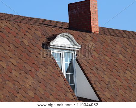 House With A Roof Made Of Metal Sheets