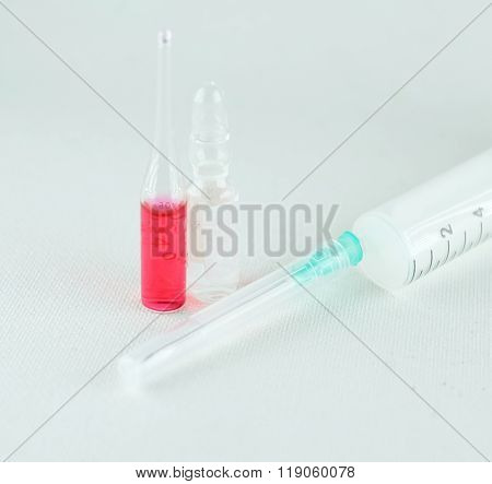 The vials and syringes
