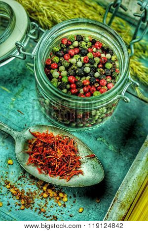 Rustic table with fine cutlerie and spices