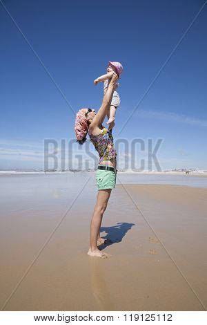 Mom Flying Baby In Arms
