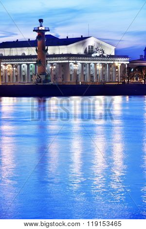 ST. PETERSBURG, RUSSIA - MARCH 18, 2015: Old Saint Petersburg Stock Exchange and Rostral columns on the spit of Vasilievsky island. The architectural complex was completed in 1811
