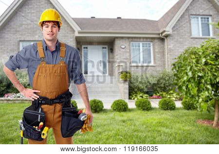 Builder handyman near new house.