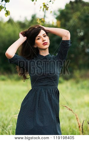 Portrait Of A Brunnete Happy And Smiling Girl
