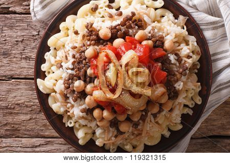 Egyptian Cuisine: Kushari Close-up On The Plate. Horizontal Top View