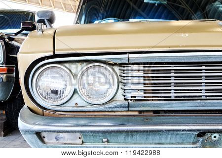 Close Up Of Headlight Lamp Vintage Classic Car. (vintage Effect Style)