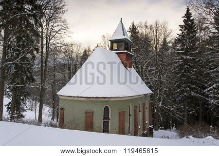 Church Of The Saint Joseph In Wood In Frosty Mountains Country Winter Evening