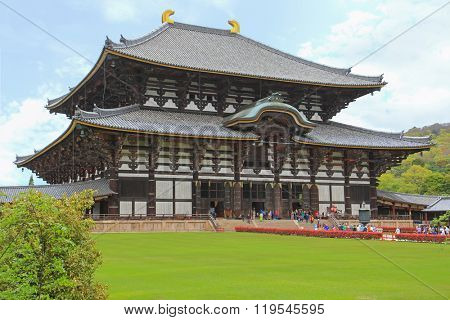 NARA, JAPAN - APRIL 2015 : People visiting Great Buddha Hall (daibutsuden) at Todai-ji Temple in Nara, Japan on April 21, 2015. It is a Buddhist temple complex listed as UNESCO World Heritage Site

