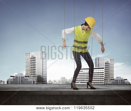 Asian Business Woman Hace String Attached On Her Body Like Marionette