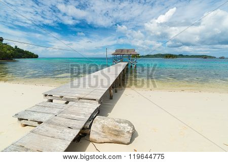Tourist Resort And Jetty On Scenic Tropical Beach In Indonesia
