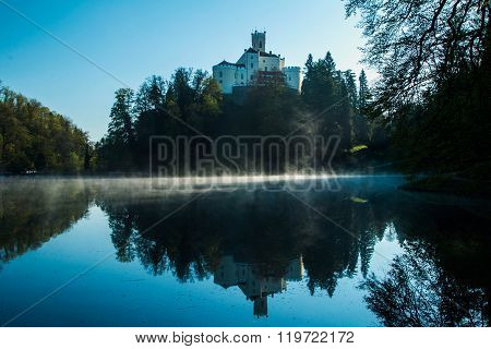 Old castle Trakoscan, Croatia, morning, sunrise on the lake
