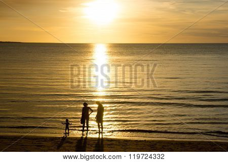 Young family at the beach