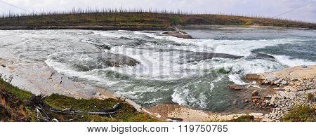Rocky Rapids On A Northern River.
