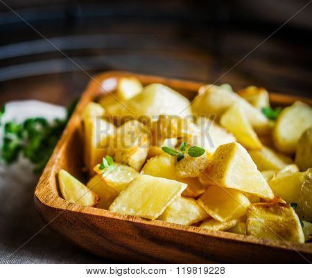 Baked Potatoes On Wooden Background