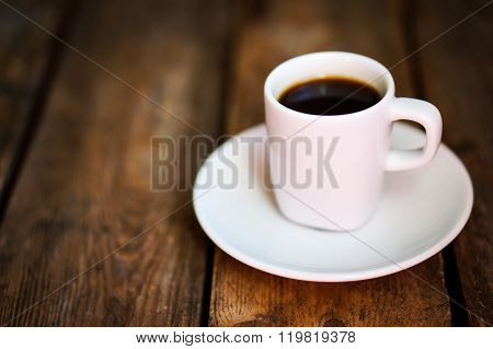 Cup Of Fresh Coffee On Rustic Wooden Background