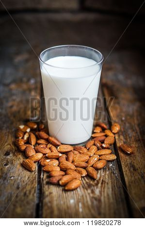 Almond Milk On Rustic Wooden Table