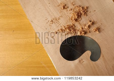 Woodworking Tool. Shavings With Scaper Blade On Workbench.