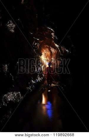 Spelunker Exploring A Cave